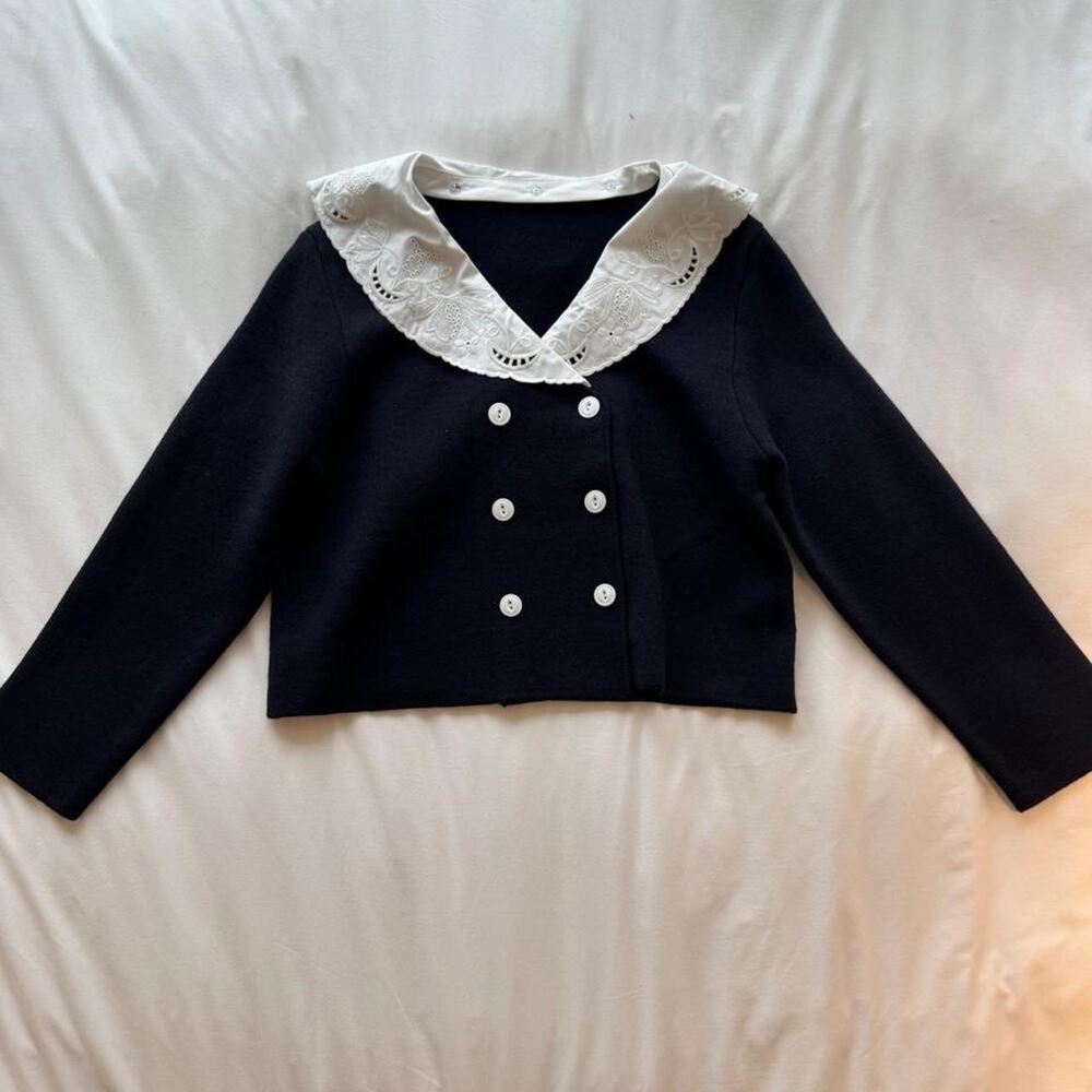 Navy blue cardigan with white lace collar